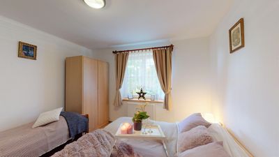 A bedroom with two beds