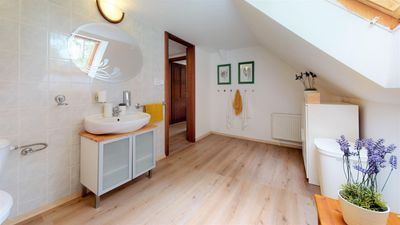 The bathroom with a basin and WC